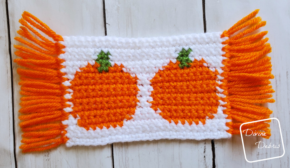 Learn to make the Cute Pumpkins Mug Rugs from 2 free tapestry crochet patterns by DivineDebris.com