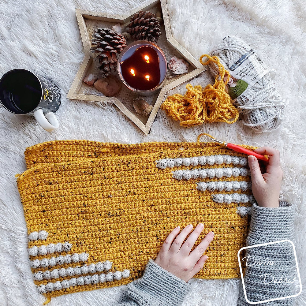 Learn to make the fun and squishy bulky weight yarn pillow, the Charismatic Pillow, from a free crochet pattern by DivineDebris.com