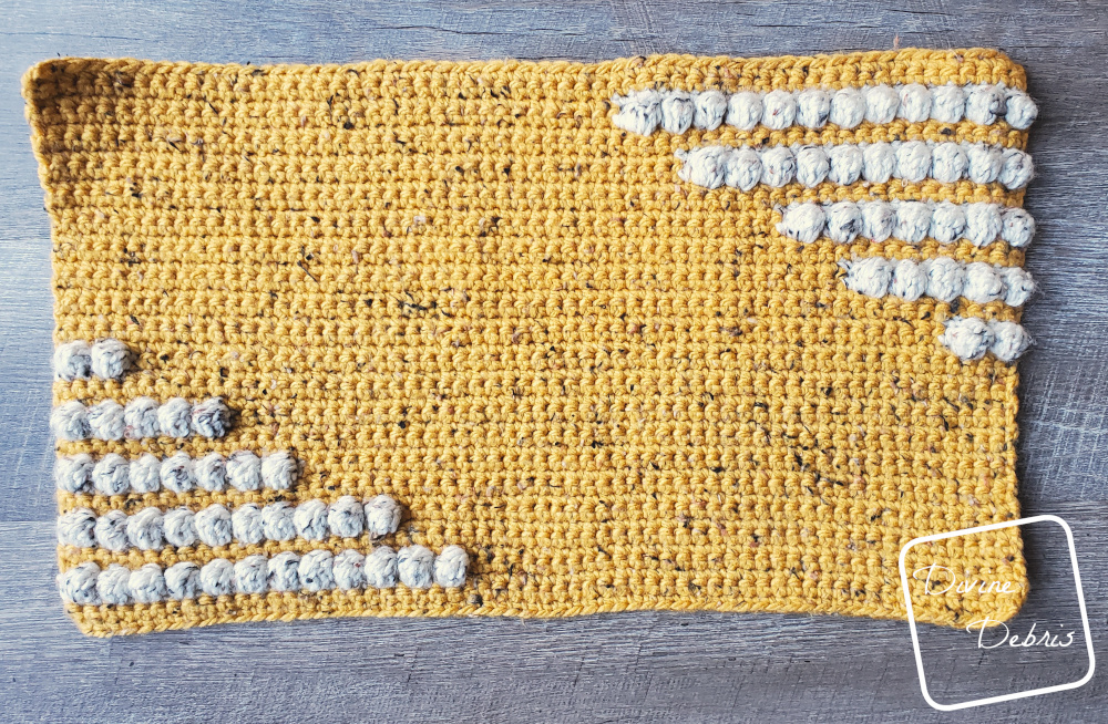 Learn to make the fun and squishy bulky weight yarn pillow, the Charismatic Pillow, from a free crochet pattern by DivineDebris.com