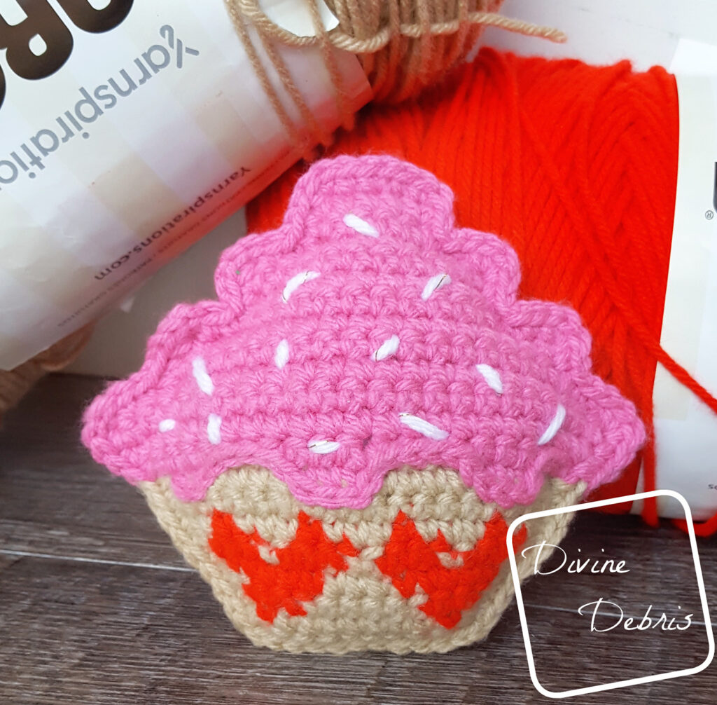 Learn to make a fun and silly Valentine's Day inspired crochet cupcake amigurumi, the Sweetheart Cupcake Ami, from a free crochet pattern 
