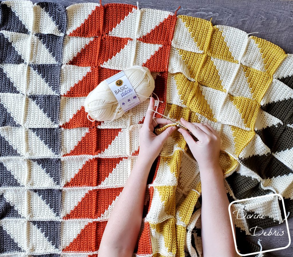 Learn to make this quilt inspired crochet throw blanket, the Divine Diamonds Throw, from a free pattern on DivineDebris.com