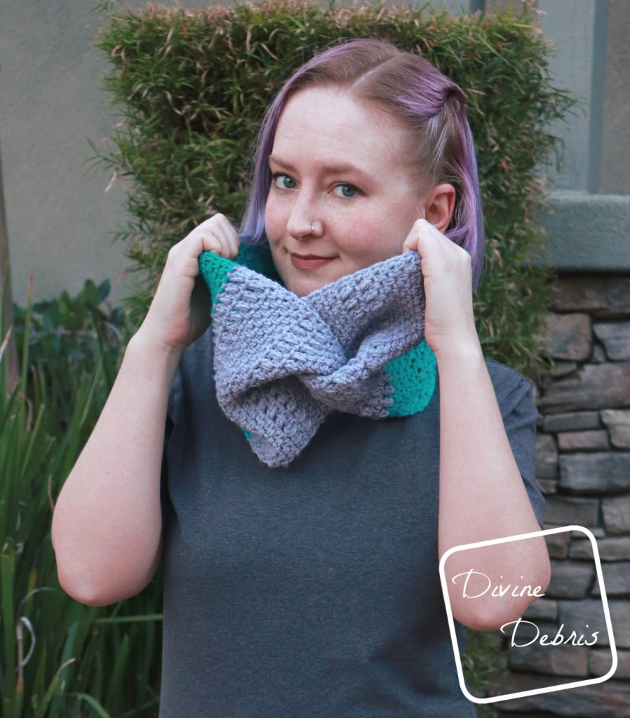 Learn how to make the Whitney Cowl, a design that combines the linen stitch, a simple puff stitch, and finished with a twist, from a free crochet pattern on DivineDebris.com