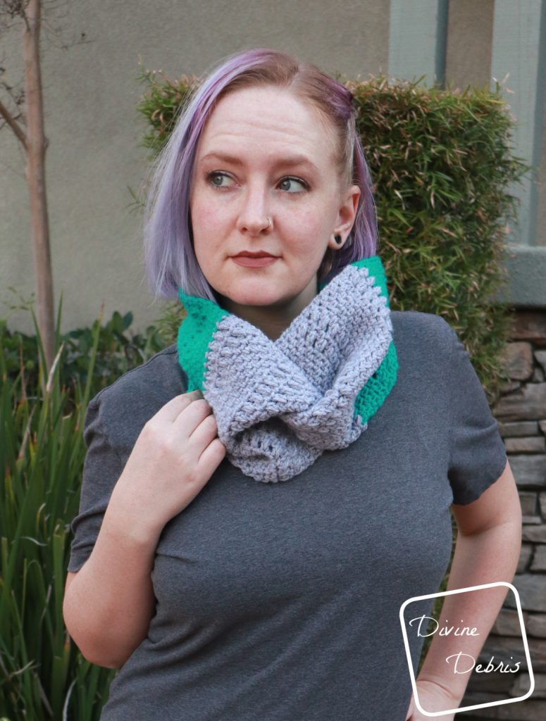 Learn how to make the Whitney Cowl, a design that combines the linen stitch, a simple puff stitch, and finished with a twist, from a free crochet pattern on DivineDebris.com